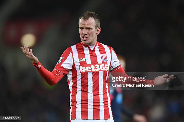 Glenn Whelan of Stoke City gestures during the Barclays Premier League match between Stoke City and Newcastle United at the Britannia Stadium on...