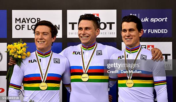 Ethan Mitchell , Edward Dawkins and Sam Webster of New Zealand celebrate winning gold medal in the Mens Team Sprint race during the UCI Track Cycling...