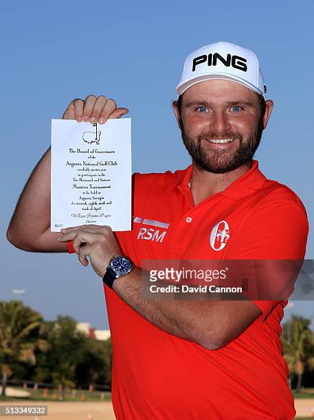Andy Sullivan of England proudly holds his invitation to the 2016 Masters Tournament at Augusta National which will be his first appearance there as...