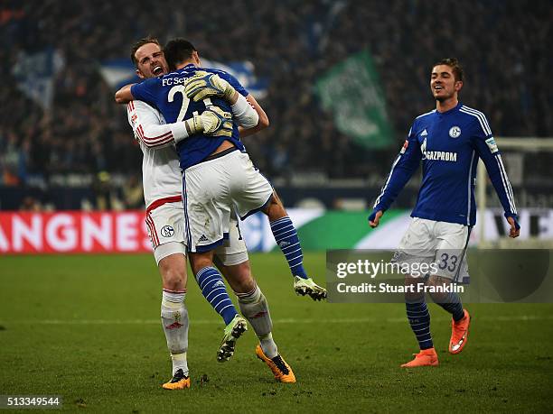 Alessandro Schöpf of Schalke celebrates scoring his goal with Ralf Fährmann during the Bundesliga match between FC Schalke 04 and Hamburger SV at...