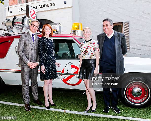 Director Paul Feig, producer Jessie Henderson, writer Katie Dippold and producer Ivan Reitman pose for a photo at the Ghostbusters Fan Event at the...