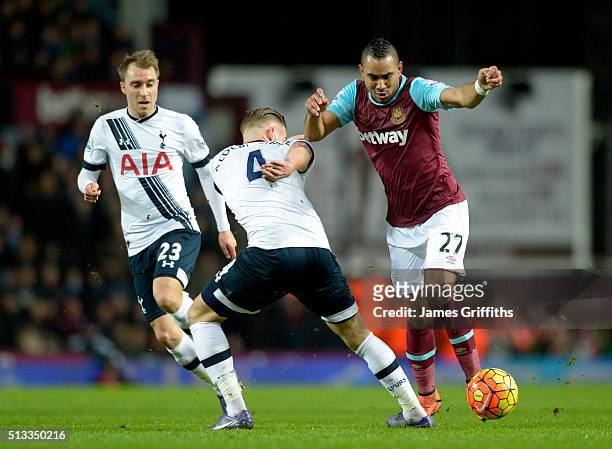 Dimitri Payet of West Ham United in action with Tottenham's Toby Alderweireld during the Barclays Premier League match between West Ham United and...