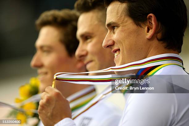 Sam Webster of New Zealand celebrates winning the gold medal in the Mens team sprint during the UCI Track Cycling World Championships at Lee Valley...