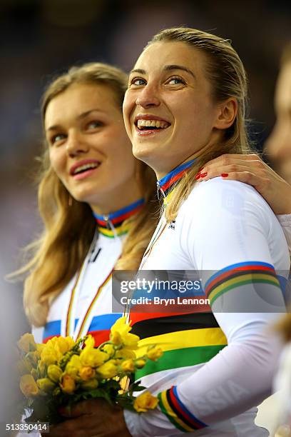 Anastasiia Voinova and Daria Shmeleva of Russia celebrate winning the gold medal in the Womens team sprint race during the UCI Track Cycling World...