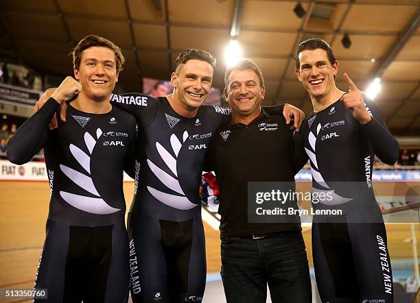 Ethan Mitchell , Edward Dawkins , and Sam Webster of New Zealand celebrate winning gold medal in the Mens Team Sprint race with Head sprint coach...