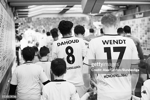 Mahmoud Dahoud of Moenchengladbach and team mates wait in the tunnel prior to the Bundesliga match between Borussia Moenchengladbach and VfB...