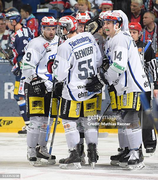 Damien Fleury, Tim Bender and Simon Danner of the Schwenninger Wild Wings celebrate after scoring the 2:2 during the game between the Eisbaeren...