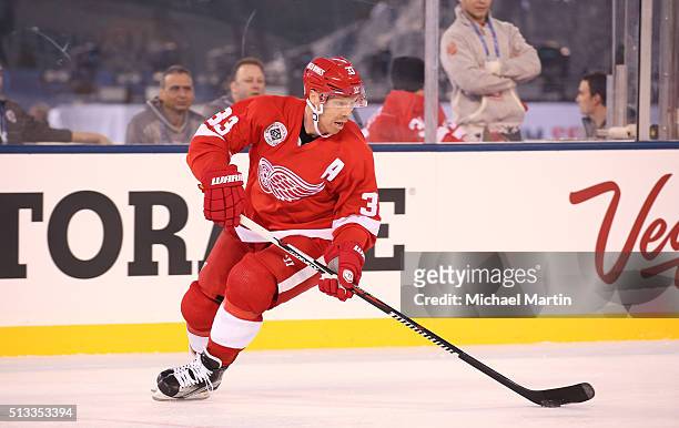 Kris Draper of the Red Wings Alumni team skates against the Colorado Avalanche Alumni team at the 2016 Coors Light Stadium Series at Coors Field on...