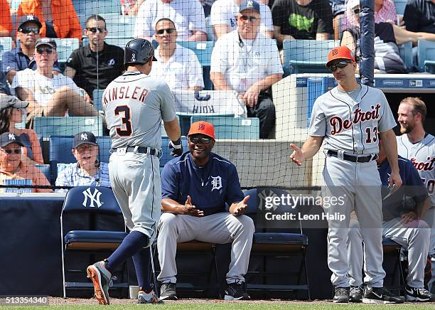 Detroit Tigers second baseman Ian Kinsler celebrates after hitting a solo home run in the fourth inning with bench coach Lloyd McClendon during the...