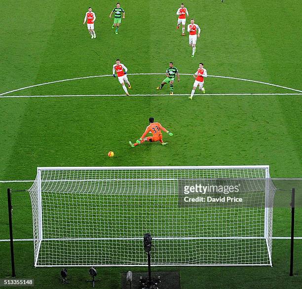 Wayne Routledge scores Swansea's 1st goal past Petr Cech of Arsenal during the Barclays Premier League match between Arsenal and Swansea City at...