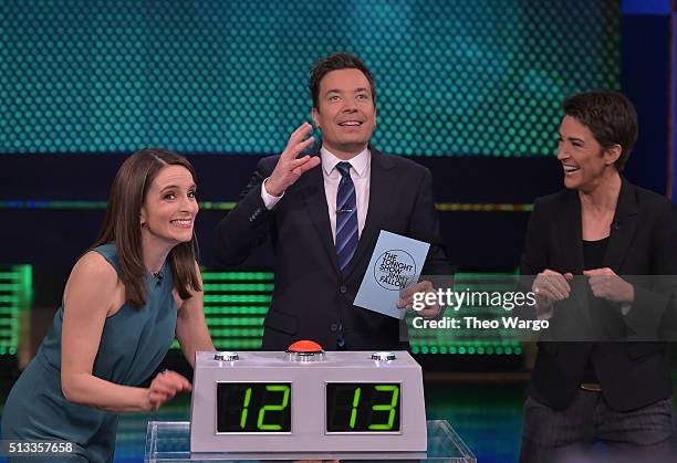 Tina Fey, Jimmy Fallon and Rachel Maddow play a game of "Know It All" during a taping of "The Tonight Show Starring Jimmy Fallon" at NBC Studios on...