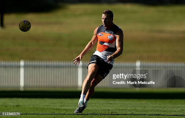 Steve Johnson of the Giants kicks the ball during a Greater Western Sydney Giants AFL training session at Drummoyne Oval on March 3, 2016 in Sydney,...