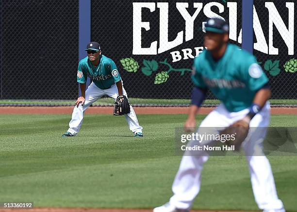 Norichika Aoki of the Seattle Mariners gets ready to make a play in left field during the first inning against the San Diego Padres at Peoria Stadium...