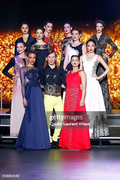 Designer Christophe Guillarme, Singer Priscilla Betti and Models walk the runway for Final during the Christophe Guillarme show as part of the Paris...