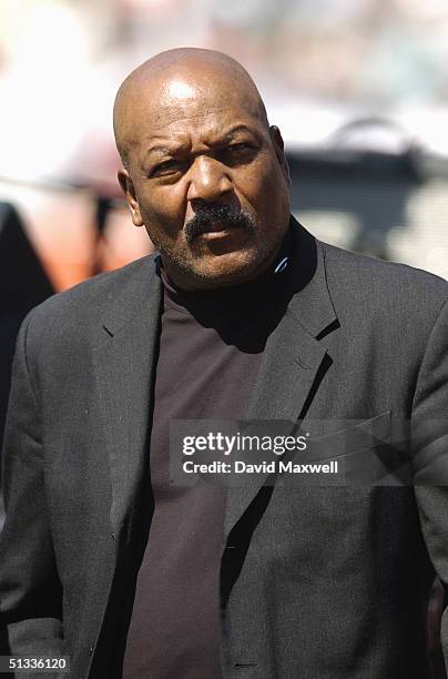 Hall of Famer Jim Brown stands on the field before the game between the Baltimore Ravens and the Cleveland Browns on September 12, 2004 at Cleveland...