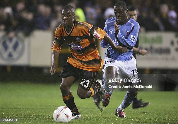 Courtney Pitt of Boston slips past Malik Buari of Fulham during the Carling Cup second round match between Boston United and Fulham on September 22,...