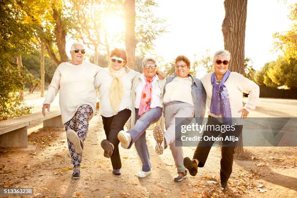 happy senior adult women wearing sunglasses - old woman dancing bildbanksfoton och bilder