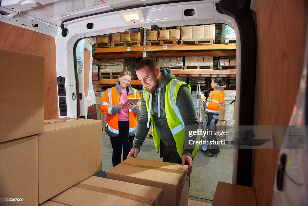 Delivery driver in the warehouse