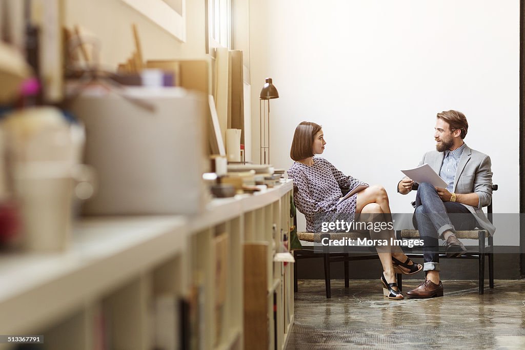 Business colleagues discussing in office