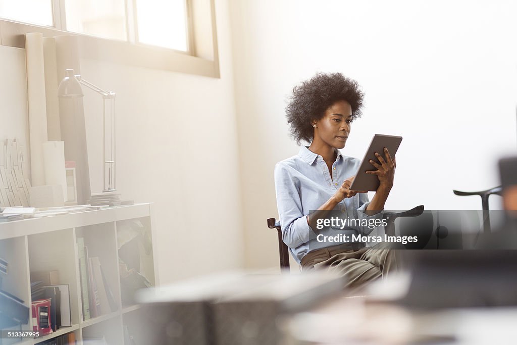 Businesswoman using digital tablet