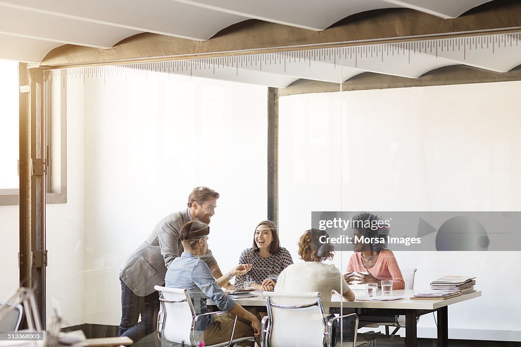 Young business colleagues in board