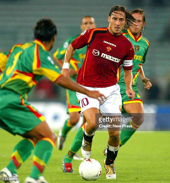 Francesco Totti of Roma moves the ball against Lecca during the Italian Serie A match between Lecce v Roma September 22, 2004 at the Olympic Stadium...