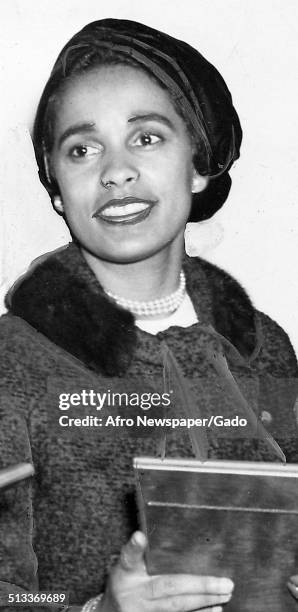 Marguerite Belafonte receiving an award, October 4, 1958.