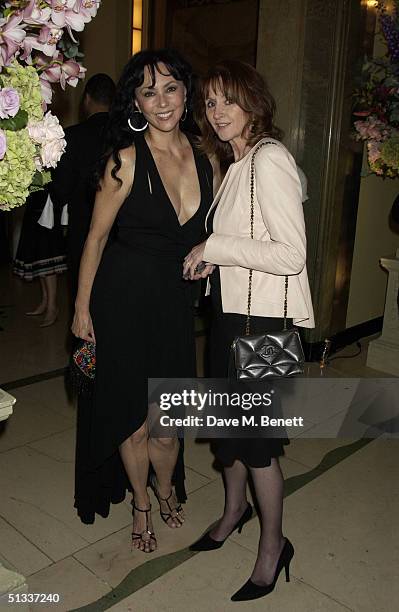 Marie Helvin and Sally Burton attends the Bruce Oldfield book launch party at The Ballroom, Claridge's on September 22, 2004 in London.