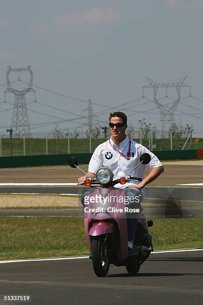 Ralf Schumacher of Germany and Williams checks out the new track during preparations for the Formula One Chinese Grand Prix at Shanghai International...