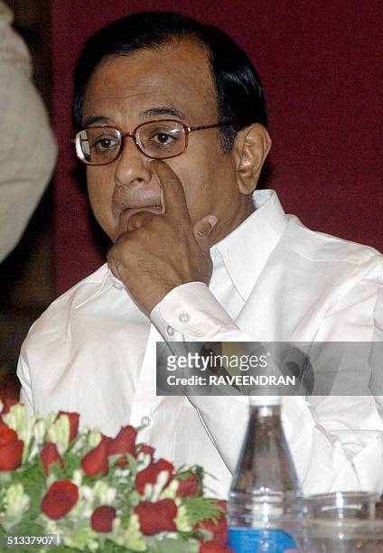 Indian Union Finance Minister P. Chidambaram gestures during a conference in New Delhi, 23 September 2004. The Empowered Committee on Value-added Tax...