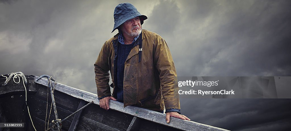 Fisherman Portrait, Stormy Sky and Dory, Nova Scotia