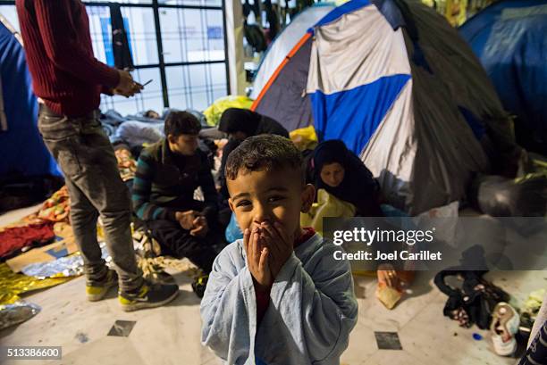 iraqi and syrian refugees on lesbos, greece - refugee crisis stock pictures, royalty-free photos & images