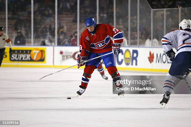 Forward Michael Ryder of the Montreal Canadiens shoots during the game against the Edmonton Oilers at the Molson Canadien Heritage Classic on...