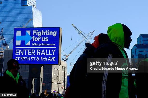People wait to enter the Javitz Center for a rally by Democratic presidential front-runner Hillary Clinton on March 2, 2016 in New York City. The...