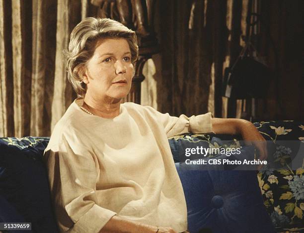 Promotional still from the American television series 'Dallas' shows Barbara Bel Geddes , as she sits on a sofa, 1979.