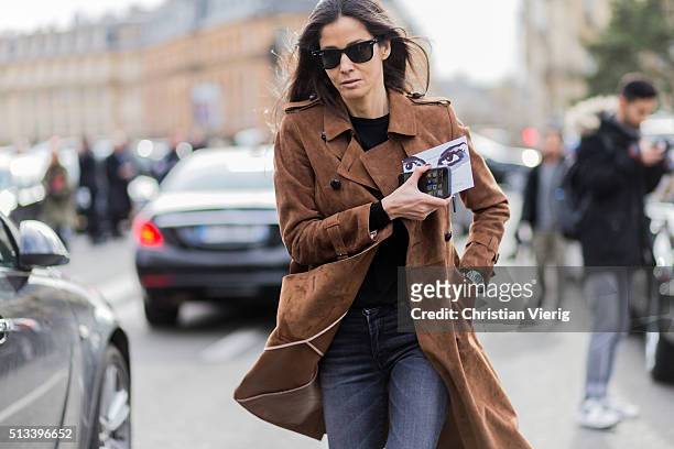 Barbara Martelo wearing a brown coat and grey denim jeans outside Dries van Noten during the Paris Fashion Week Womenswear Fall/Winter 2016/2017 on...
