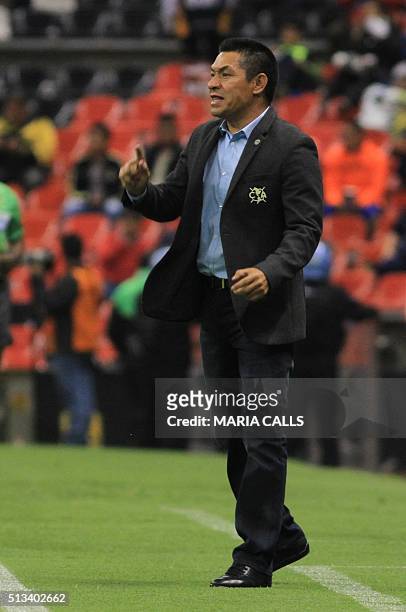 The coach of Mexican club America Ignacio Ambriz gives instructions to his players during their CONCACAF Champions League quarterfinal football match...