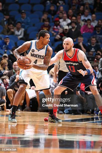 Greg Smith of the Minnesota Timberwolves handles the ball against Marcin Gortat of the Washington Wizards on March 2, 2016 at Target Center in...