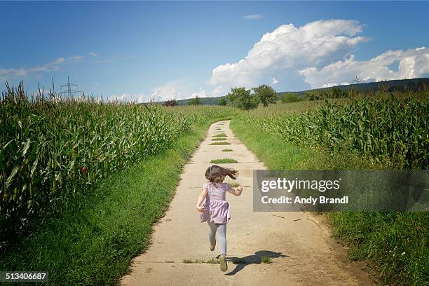 the road ahead - girl soles stock pictures, royalty-free photos & images