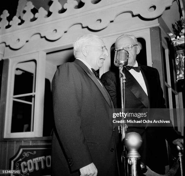 Film producer Louis B. Mayer walks to the microphone before an MGM movie premiere in Los Angeles,CA.