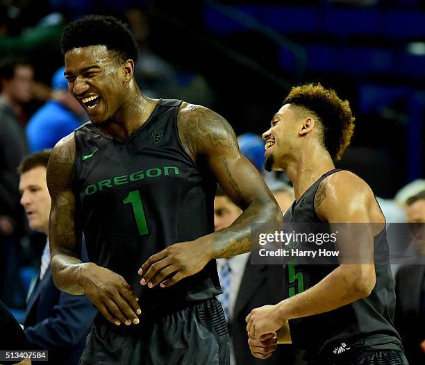 Jordan Bell and Tyler Dorsey of the Oregon Ducks celebrate a 76-68 win over the UCLA Bruins at Pauley Pavilion on March 2, 2016 in Los Angeles,...