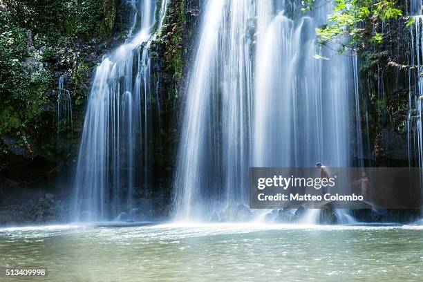 Powerful waterfall in the green forest of Costa Rica