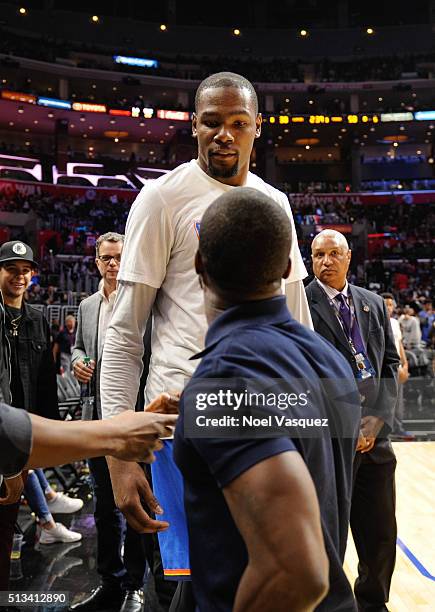 Kevin Hart talks to Kevin Durant at a basketball game between the Oklahoma City Thunder and the Los Angeles Clippers at Staples Center on March 2,...