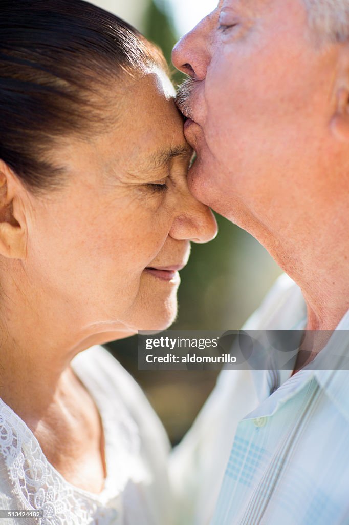 Man kissing her wife