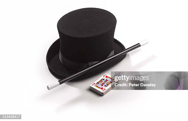 magician's hat, wand and cards - magic wand stock-fotos und bilder