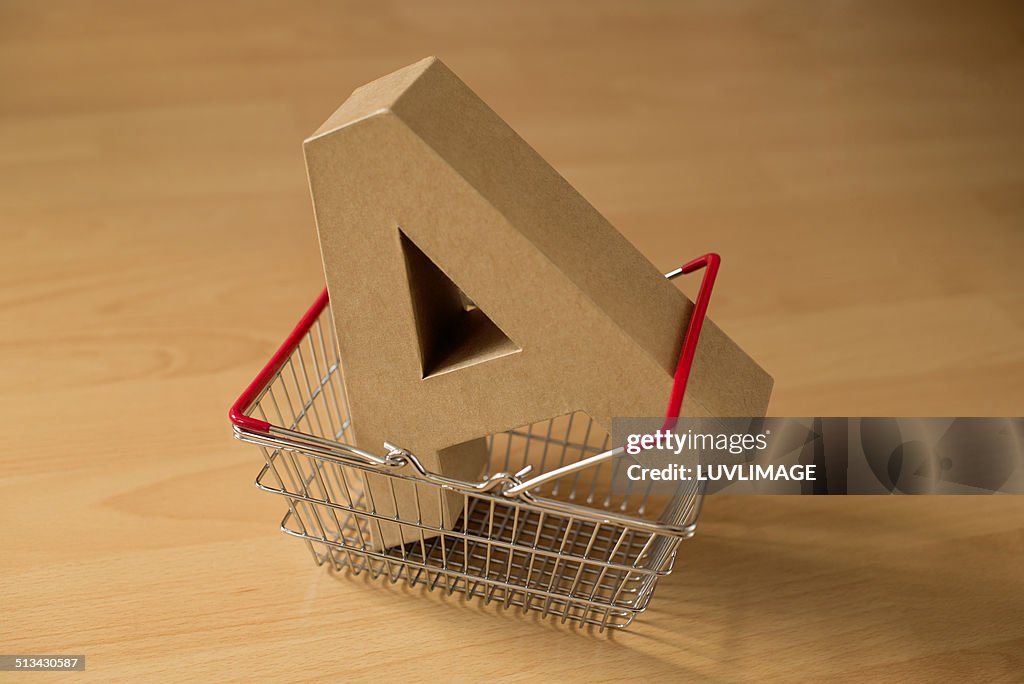 Shopping basket with capital letter A in it