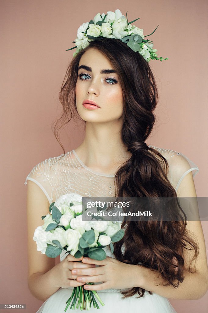 Studio shot of young beautiful bride