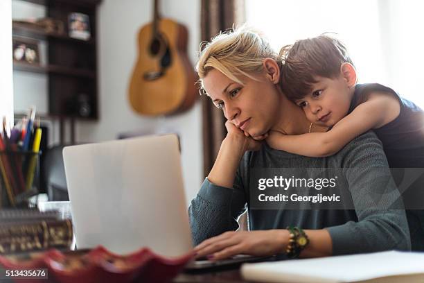 i love you mom! - multitasking parent stock pictures, royalty-free photos & images