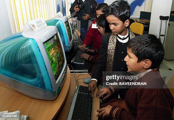 The Poor Learning Computer Poor Kids On Computers Photos and Premium High Res Pictures - Getty Images