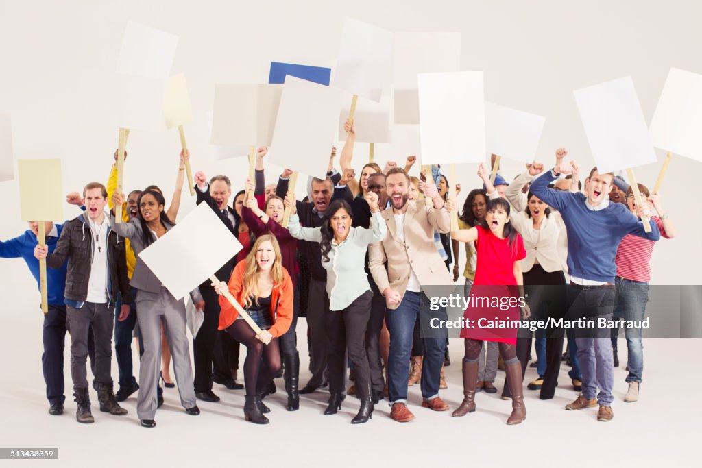 Protesters with picket signs